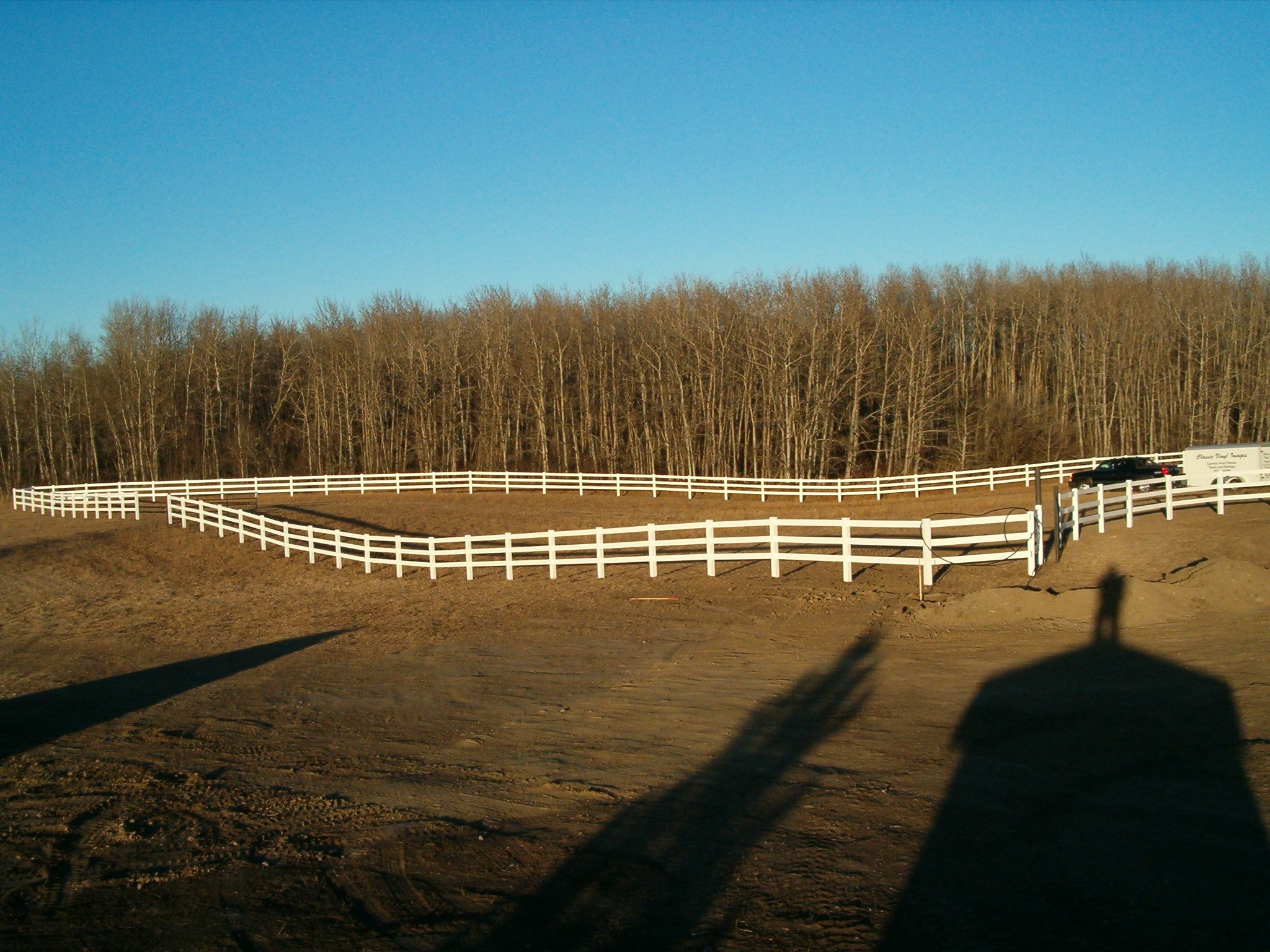 Fence supplier helping homeowners in Calgary choose durable vinyl fences.